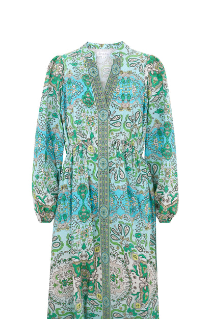 Long sleeve dress with green and white pattern on a white background